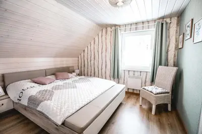 Ein Bett oder Betten in einem Zimmer der Unterkunft Glanzstück