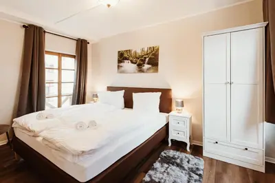 Ein Bett oder Betten in einem Zimmer der Unterkunft Gutshof zu Quedlinburg