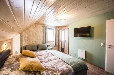 Ein Bett oder Betten in einem Zimmer der Unterkunft Waldstück