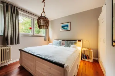 Ein Bett oder Betten in einem Zimmer der Unterkunft Goldener Hirsch Braunlage