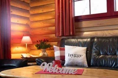 Ein Sitzbereich in der Unterkunft HyggeZeit im Holzblockhaus in Wernigerode