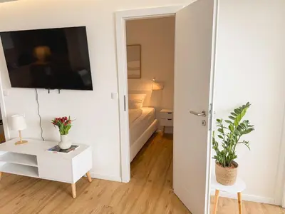 Ein Bett oder Betten in einem Zimmer der Unterkunft Apartment Wolfswarte, Panorama, Sauna, Schwimmbad