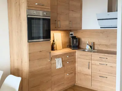 Küche/Küchenzeile in der Unterkunft Apartment Wolfswarte, Panorama, Sauna, Schwimmbad