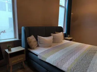 Ein Bett oder Betten in einem Zimmer der Unterkunft New studio-style holiday apartment in the historic old town of Quedlinburg