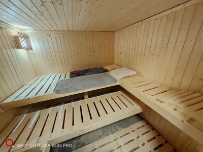 Ein Bett oder Betten in einem Zimmer der Unterkunft RuDi Ferien Ressort