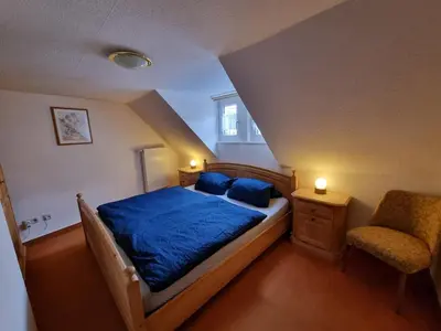 Ein Bett oder Betten in einem Zimmer der Unterkunft Ferienhaus Inge