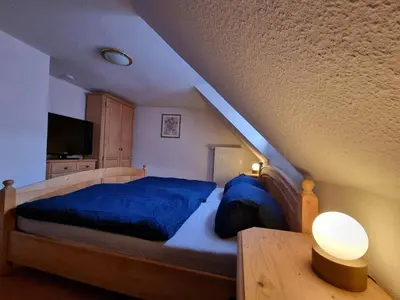 Ein Bett oder Betten in einem Zimmer der Unterkunft Ferienhaus Inge