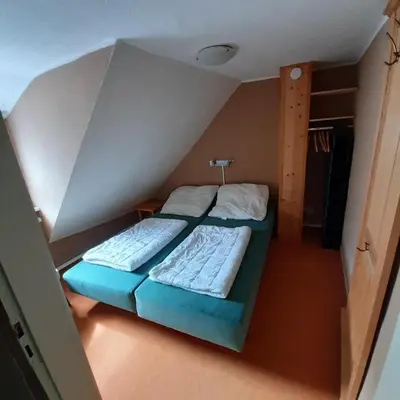 Ein Bett oder Betten in einem Zimmer der Unterkunft Ferienhaus Inge
