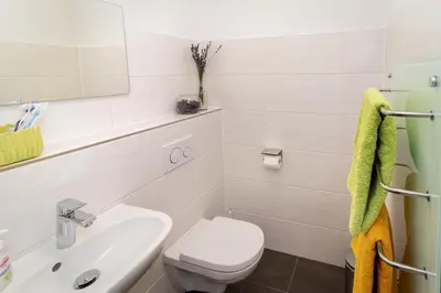 Ein Badezimmer in der Unterkunft Ferienwohnung Haus Sonnenschein mit E-Ladesäule