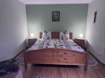 Ein Bett oder Betten in einem Zimmer der Unterkunft Ferienwohnung Steinpilz