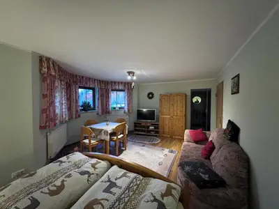 Ein Bett oder Betten in einem Zimmer der Unterkunft Ferienwohnung Steinpilz