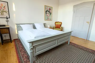 Ein Bett oder Betten in einem Zimmer der Unterkunft Villa Hermine