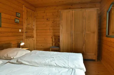 Ein Bett oder Betten in einem Zimmer der Unterkunft Feriendorf Blauvogel Blauvogel 022