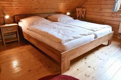 Ein Bett oder Betten in einem Zimmer der Unterkunft Feriendorf Blauvogel Blauvogel 022