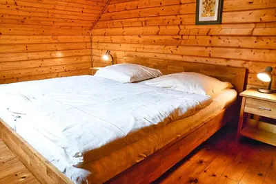 Ein Bett oder Betten in einem Zimmer der Unterkunft Feriendorf Blauvogel Blauvogel 022