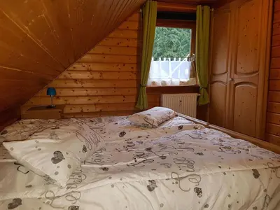 Ein Bett oder Betten in einem Zimmer der Unterkunft Feriendorf Blauvogel Blauvogel 046