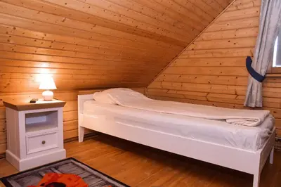 Ein Bett oder Betten in einem Zimmer der Unterkunft Feriendorf Blauvogel Blauvogel 054