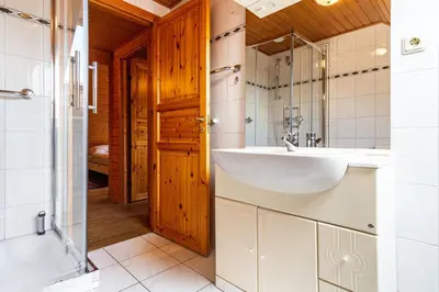 Ein Badezimmer in der Unterkunft Feriendorf Blauvogel Blauvogel 054