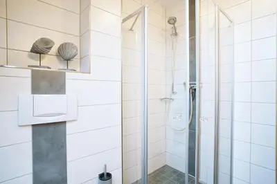 Ein Badezimmer in der Unterkunft Auerhahn Ferienhäuser Auerhahn 114