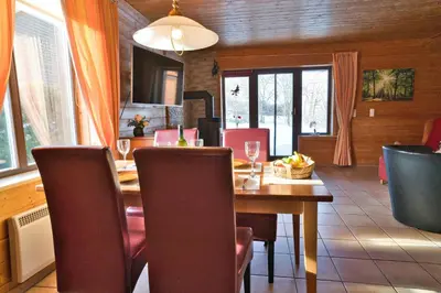Ein Sitzbereich in der Unterkunft Auerhahn Ferienhäuser Auerhahn 319