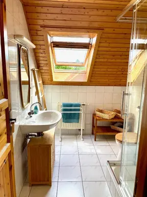 Ein Badezimmer in der Unterkunft Ferienhaus Blauvogel 4