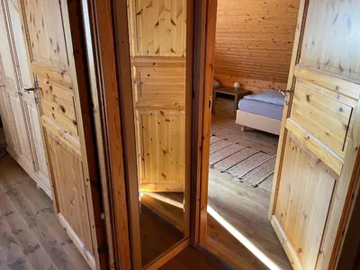 Ein Bett oder Betten in einem Zimmer der Unterkunft Ferienhaus Blauvogel 19