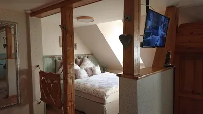 Ein Bett oder Betten in einem Zimmer der Unterkunft Schlossbergbutze