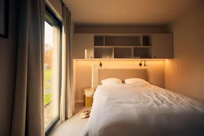 Ein Bett oder Betten in einem Zimmer der Unterkunft Harz Eco Lodges