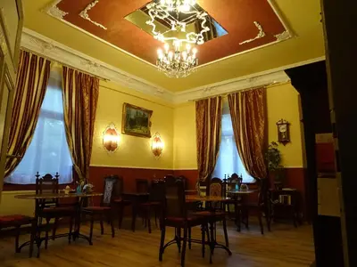 Ein Sitzbereich in der Unterkunft Villa Imperia, Museums-Hotel, Treppensteigen