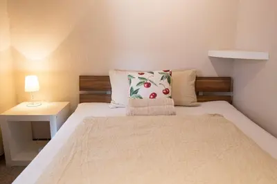 Ein Bett oder Betten in einem Zimmer der Unterkunft Ferienapartment 