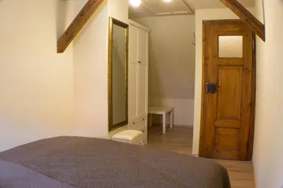 Ein Bett oder Betten in einem Zimmer der Unterkunft Ferienhaus Stobenstrasse