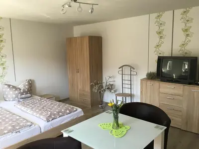 Ein Bett oder Betten in einem Zimmer der Unterkunft Ferienhaus Bülow