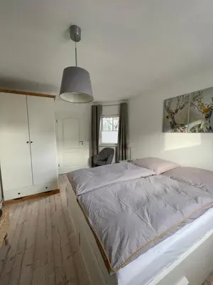 Ein Bett oder Betten in einem Zimmer der Unterkunft Harzer Anneliese