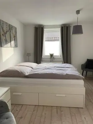 Ein Bett oder Betten in einem Zimmer der Unterkunft Harzer Anneliese