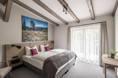 Ein Bett oder Betten in einem Zimmer der Unterkunft Harztrail Lodge