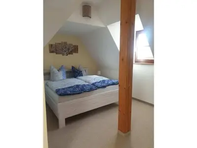 Ein Bett oder Betten in einem Zimmer der Unterkunft Zum Kuckucksnest Comfortable holiday residence