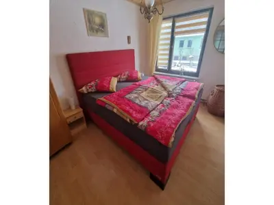 Ein Bett oder Betten in einem Zimmer der Unterkunft Gemütliches Ferienhaus mit Pool in Blankenburg