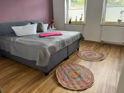 Ein Bett oder Betten in einem Zimmer der Unterkunft Parkblick