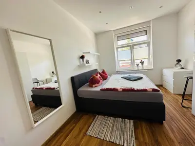 Ein Bett oder Betten in einem Zimmer der Unterkunft Parkblick