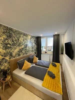 TV/Unterhaltungsangebot in der Unterkunft Komfort Apartments am Badepark, Modern! Stylisch! Geräumig!