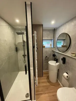 Ein Badezimmer in der Unterkunft Komfort Apartments am Badepark, Modern! Stylisch! Geräumig!
