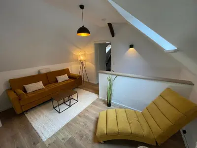 Ein Sitzbereich in der Unterkunft Komfort Apartments am Badepark, Modern! Stylisch! Geräumig!