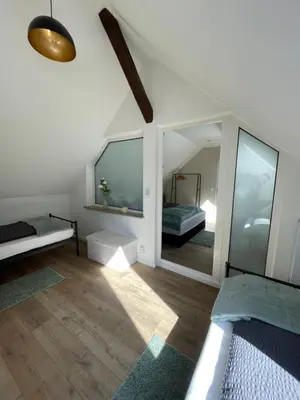 Ein Bett oder Betten in einem Zimmer der Unterkunft Komfort Apartments am Badepark, Modern! Stylisch! Geräumig!