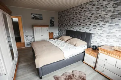 Ein Bett oder Betten in einem Zimmer der Unterkunft Ferienwohnung Rose