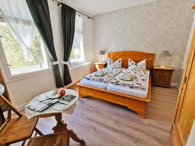 Ein Bett oder Betten in einem Zimmer der Unterkunft Pension im Tal der Stille