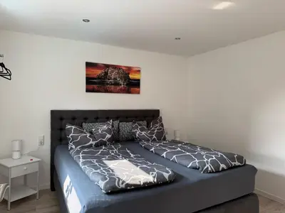 Ein Bett oder Betten in einem Zimmer der Unterkunft Harznester - Nest am Schloss