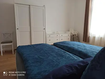 Ein Bett oder Betten in einem Zimmer der Unterkunft Familienfreundliche Ferienwohnung
