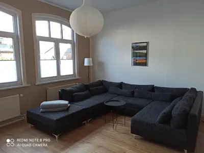 Ein Sitzbereich in der Unterkunft Familienfreundliche Ferienwohnung