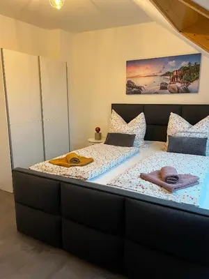 Ein Bett oder Betten in einem Zimmer der Unterkunft International 7 a