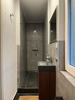 Ein Badezimmer in der Unterkunft International 7 a